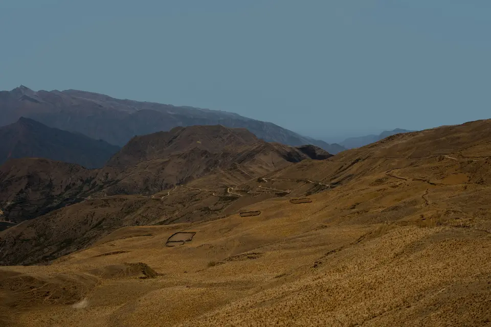 Dry, rolling hills under a clear blue sky — Quebrada de Humahuaca