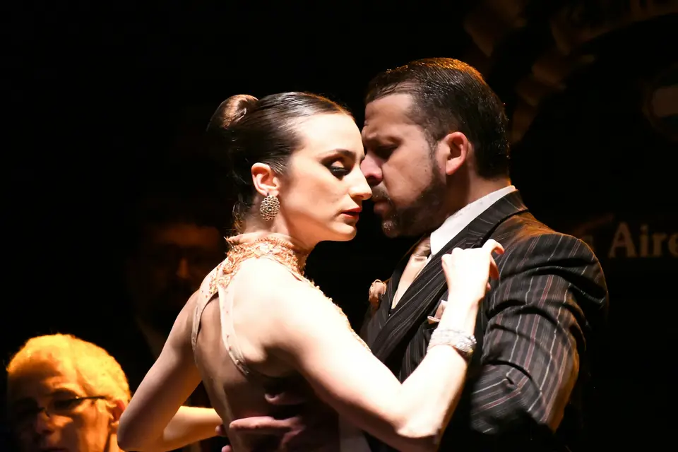 A couple dances the tango with passion
